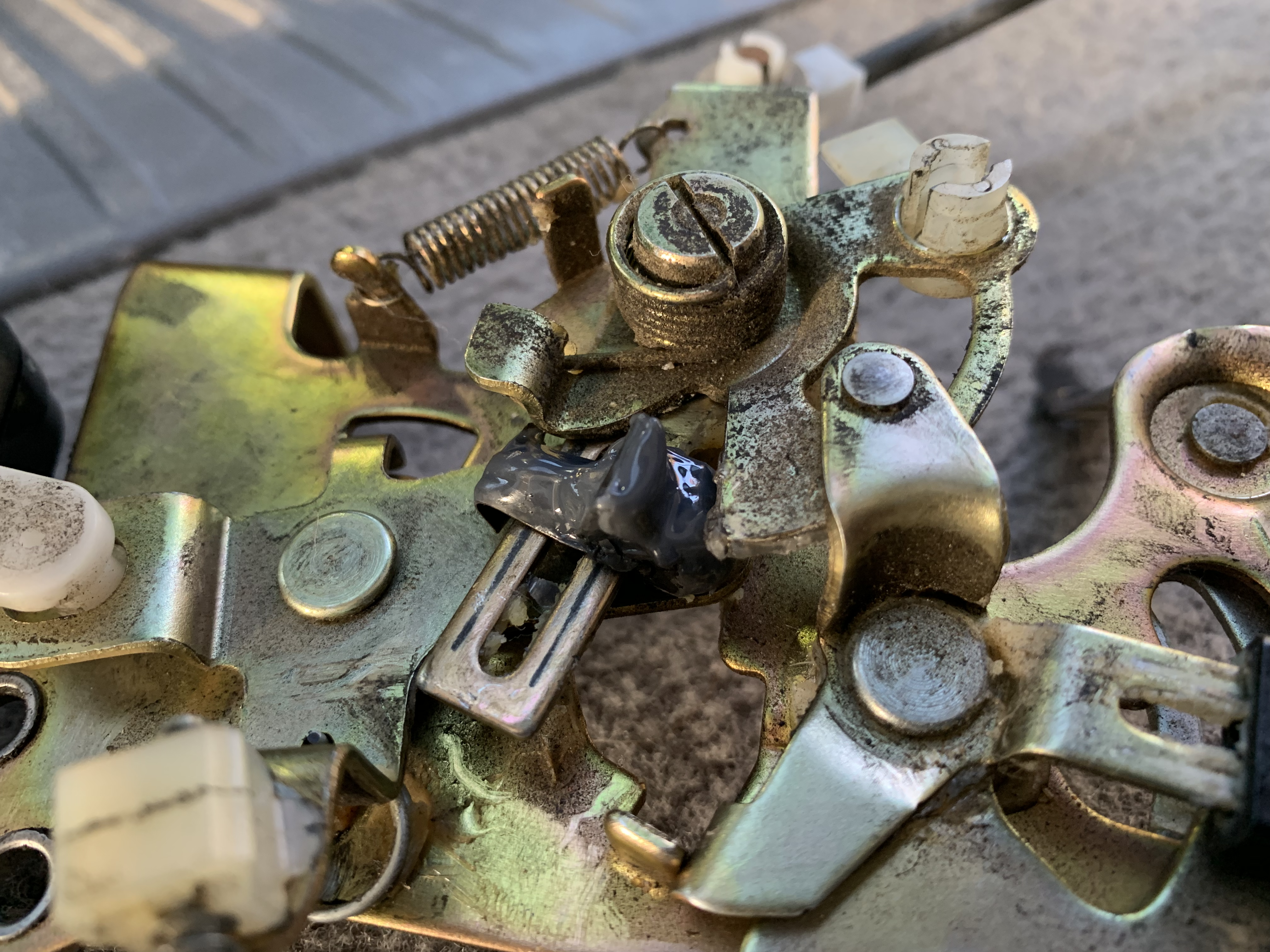 The second attempt sitting in the locking mechanism. There is too much epoxy on the knob, making the knob too wide.